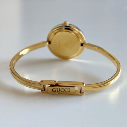 Gucci 1990s Interchangeable Bezel Gold Plated Bangle Watch with 12 bezels, case