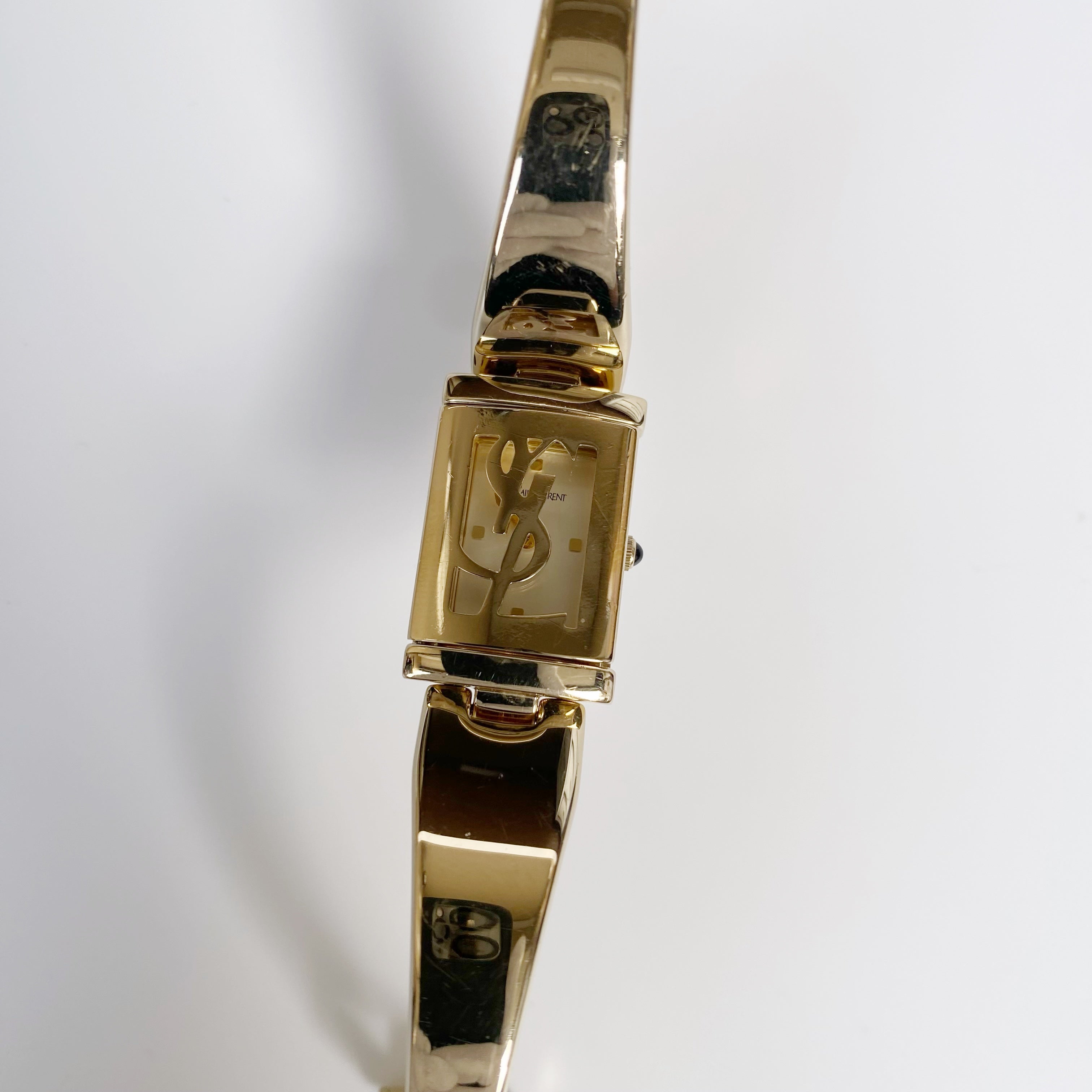 80s イヴ・サンローラン YSL gold l bangle Yves Saint Laurent 1990s Gold Plated Bangle Watch – Lorinaté