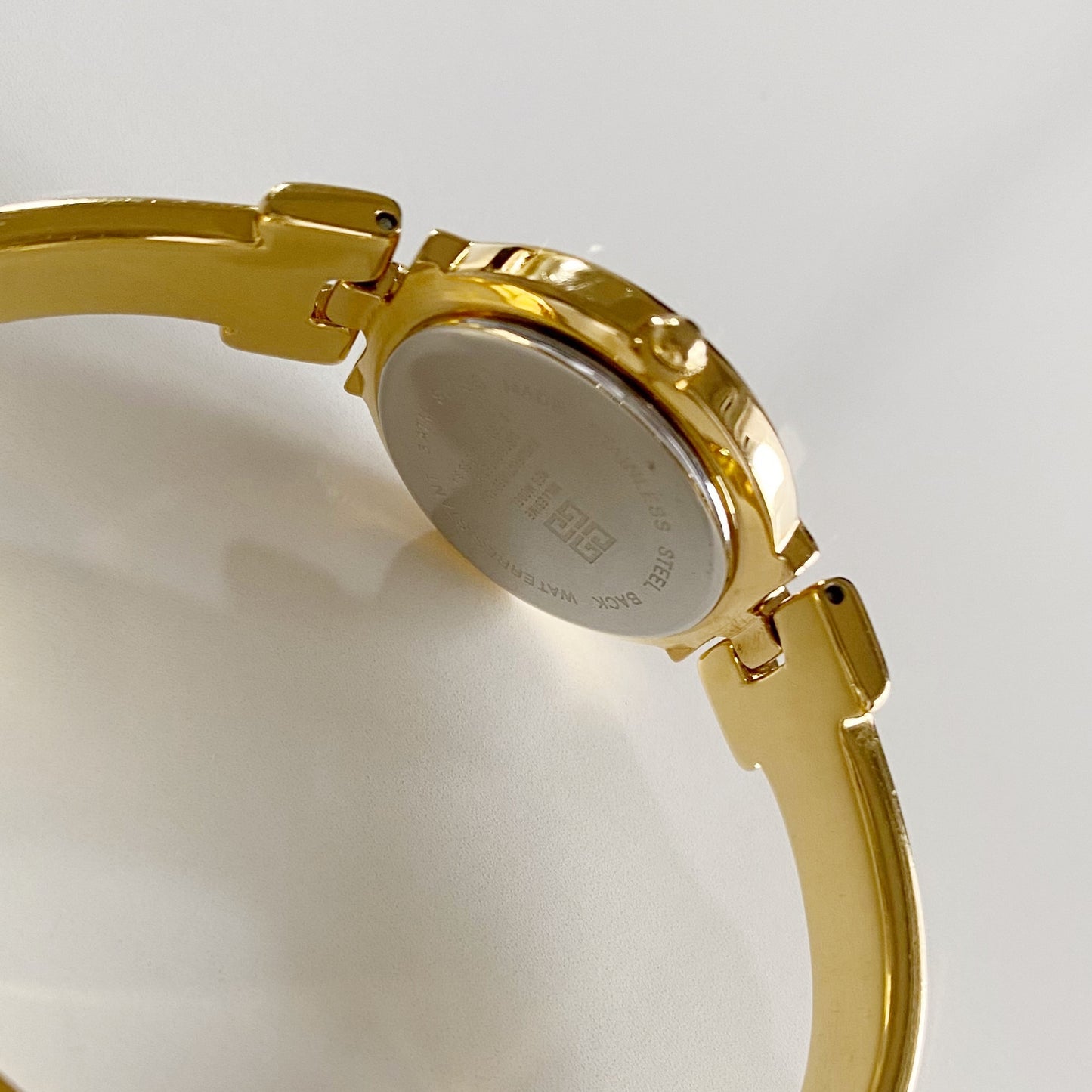 Givenchy 1990s Black Dial Gold Plated Bangle Watch