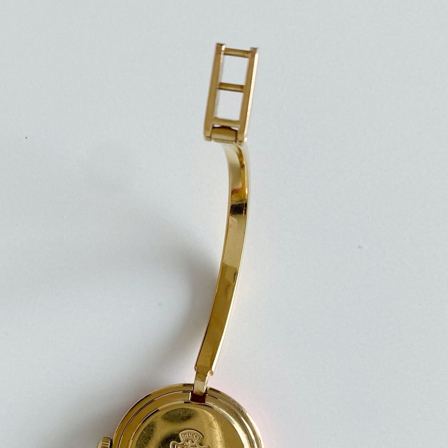 Gucci 1990s Interchangeable Bezel Gold Plated Bangle Watch with 12 bezels, case (Small)