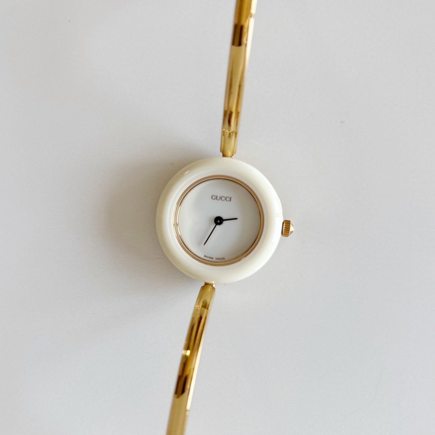 Gucci 1990s Interchangeable Bezel Gold Plated Bangle Watch with 12 bezels, case