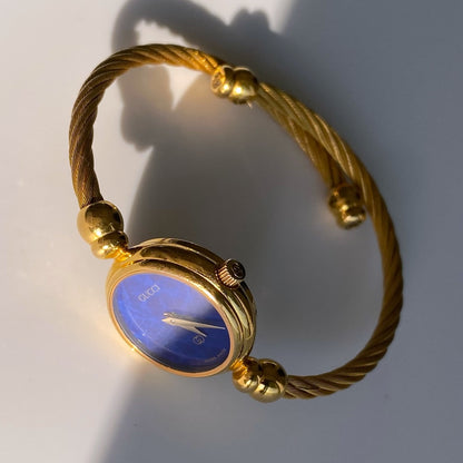 Gucci 1990s Blue Dial Gold Plated Cable Bangle Watch