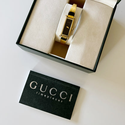 Gucci 1990s Rectangular Black Dial Gold Plated Bangle Watch