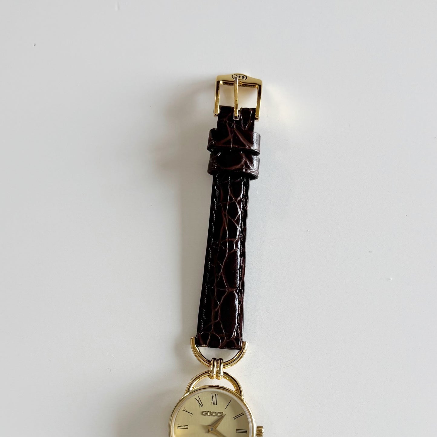 Gucci 1990s Gold Round Dial Horsebit Gold Plated Watch