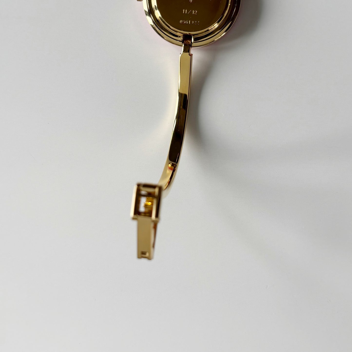 Gucci 1990s Interchangeable Bezel Gold Plated Bangle Watch with 12 bezels, case