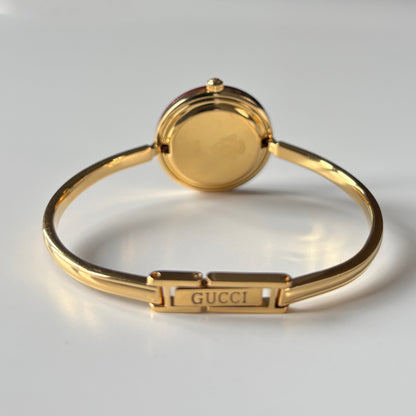 Gucci 1990s Interchangeable Bezel Gold Plated Bangle Watch with 12 bezels, case