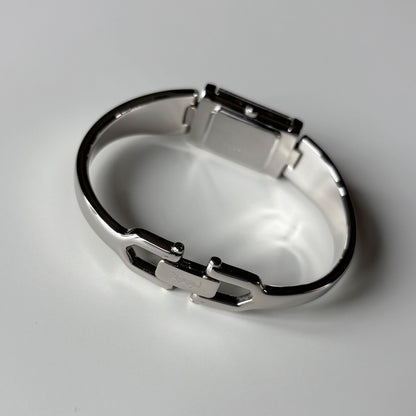Yves Saint Laurent 1990s Black Dial Silver Bangle Watch