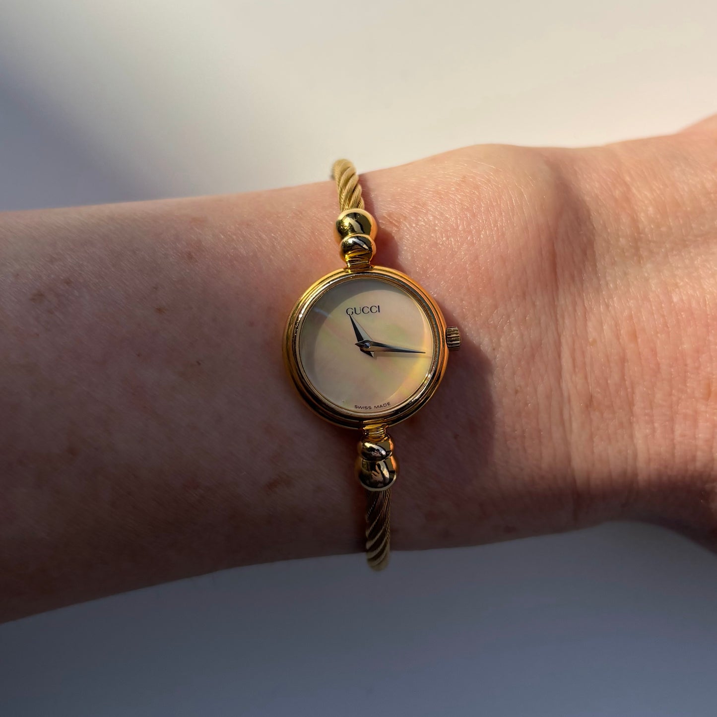 Gucci 1990s Seashell Dial Gold Plated Cable Bangle Watch