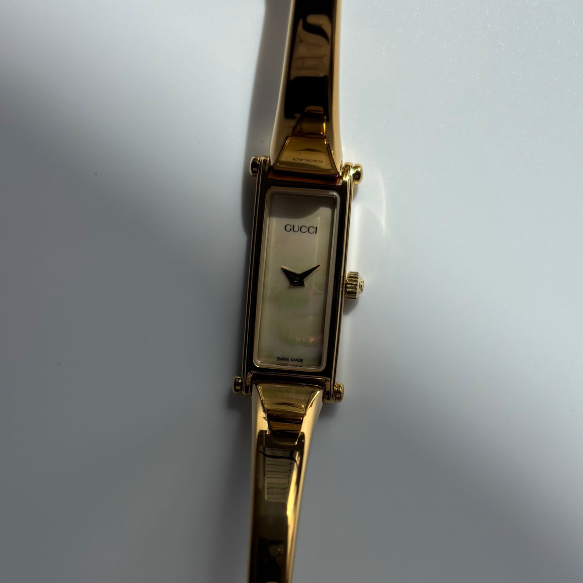 Gucci 1990s Seashell Rectangular Dial Gold Plated Bangle Watch