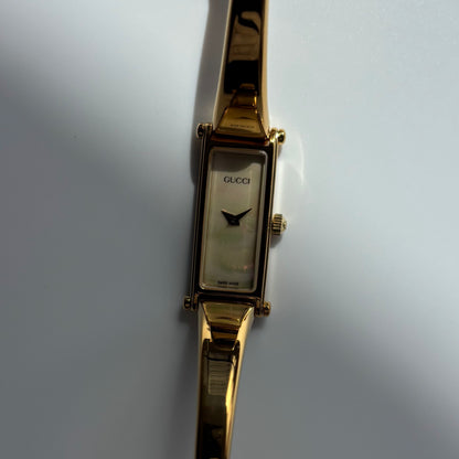 Gucci 1990s Seashell Rectangular Dial Gold Plated Bangle Watch