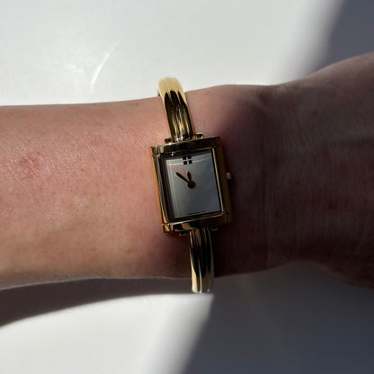 Yves Saint Laurent 1990s Seashell Dial Gold Plated Bangle Watch