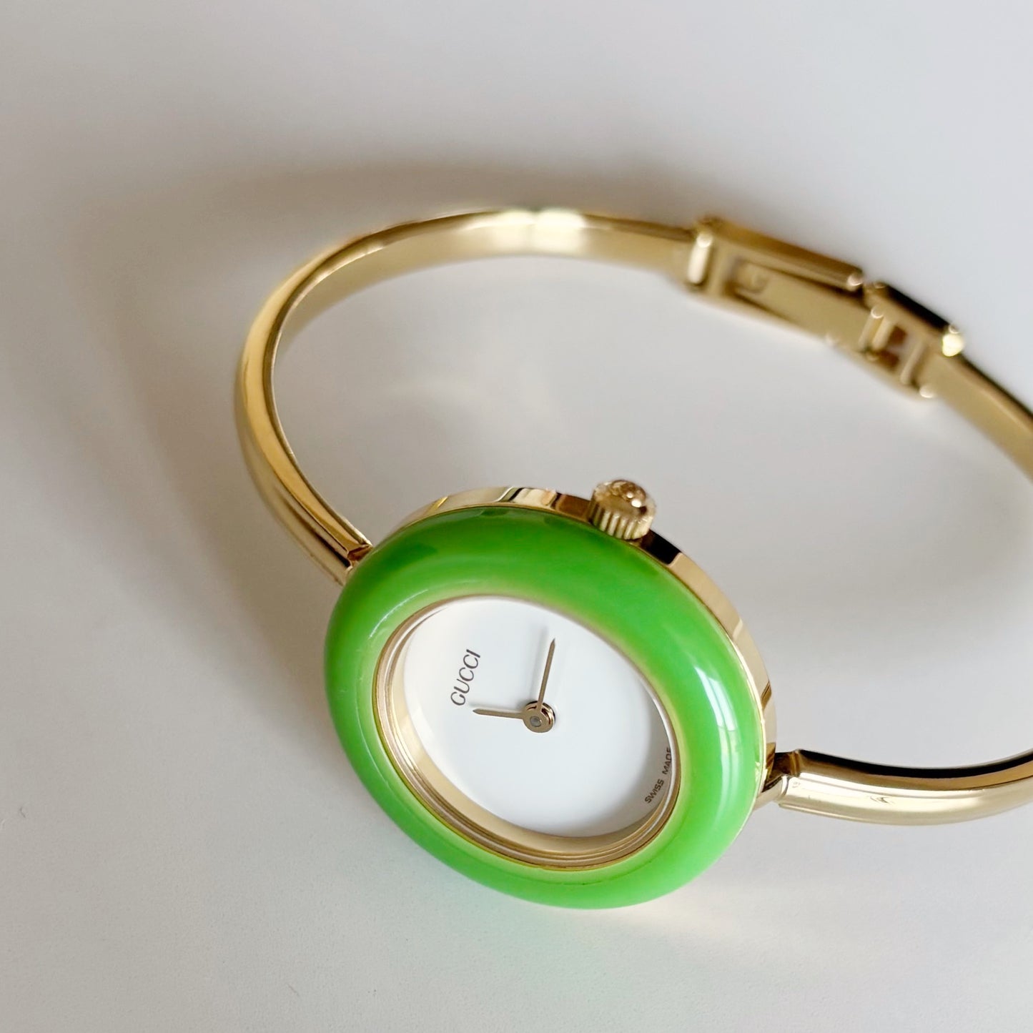 Gucci 1990s Interchangeable Bezel Gold Plated Bangle Watch with 12 bezels, case