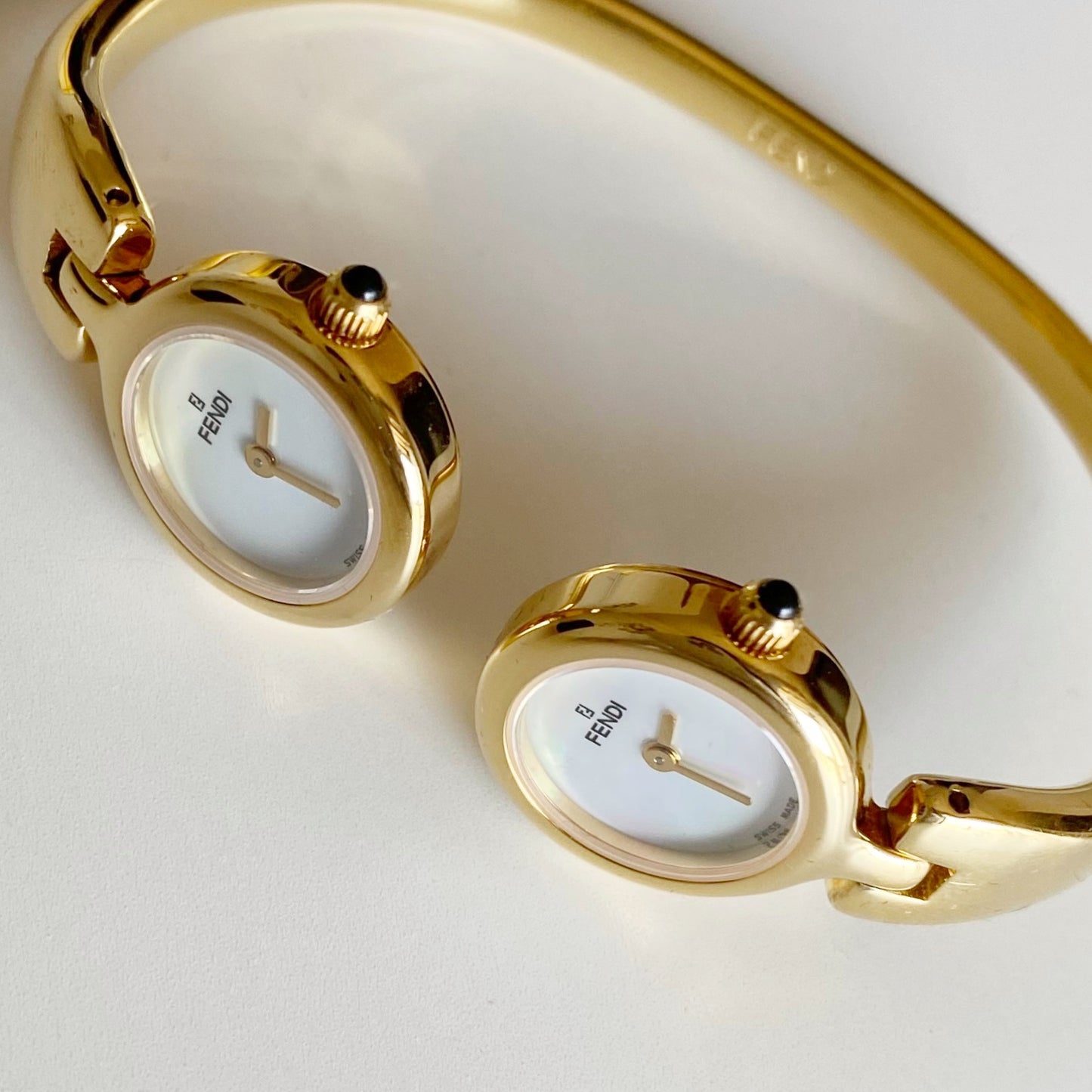 Fendi 1990s Seashell Dial Two Time Zone Gold Plated Bangle Watch