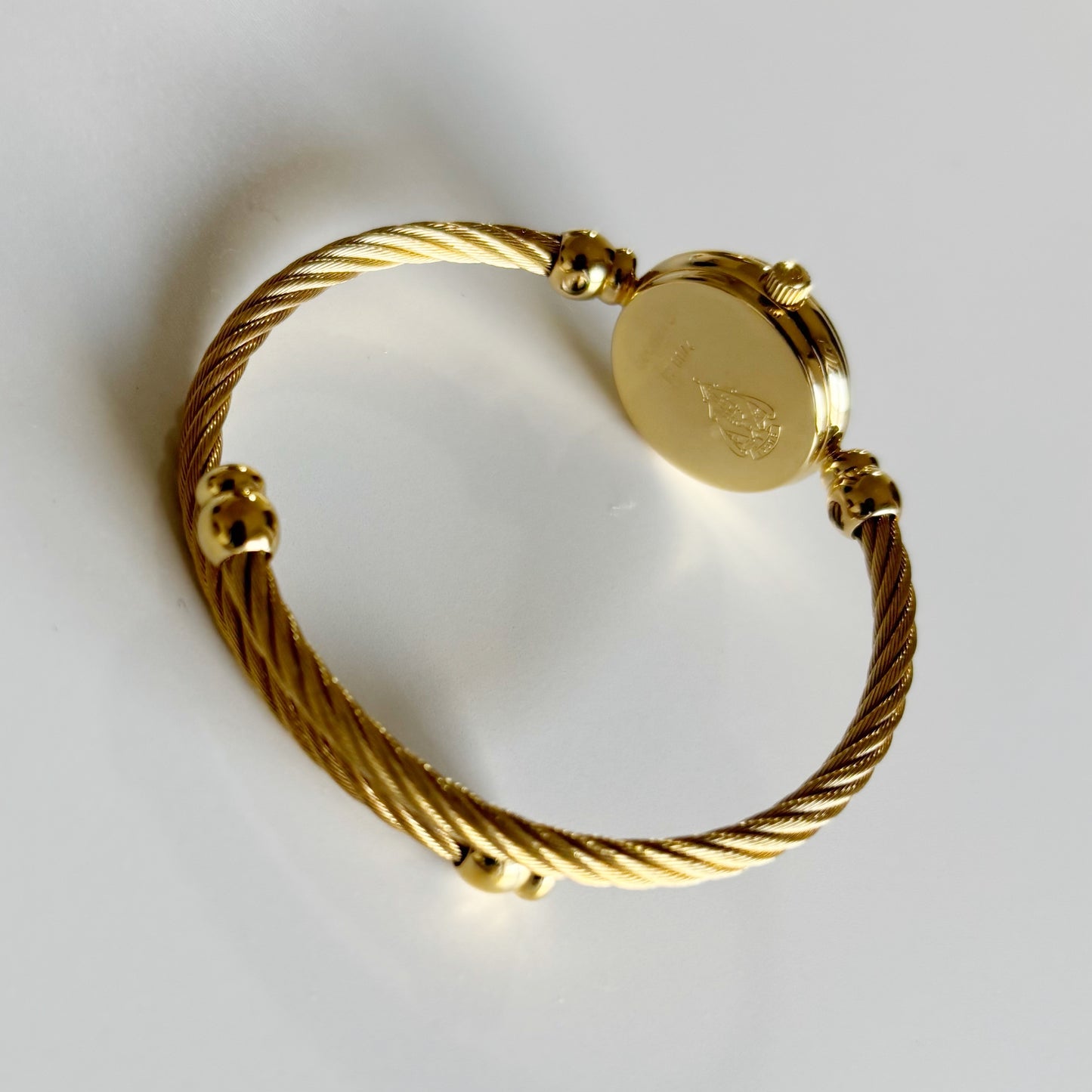 Gucci 1990s Seashell Dial Gold Plated Cable Bangle Watch