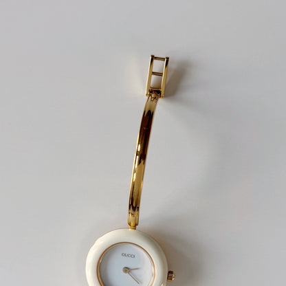 Gucci 1990s Interchangeable Bezel Gold Plated Bangle Watch with case, 12 bezels (Small)