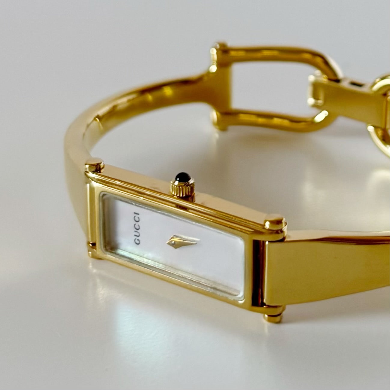 Gucci 1990s Seashell Rectangular Dial Gold Plated Bangle Watch