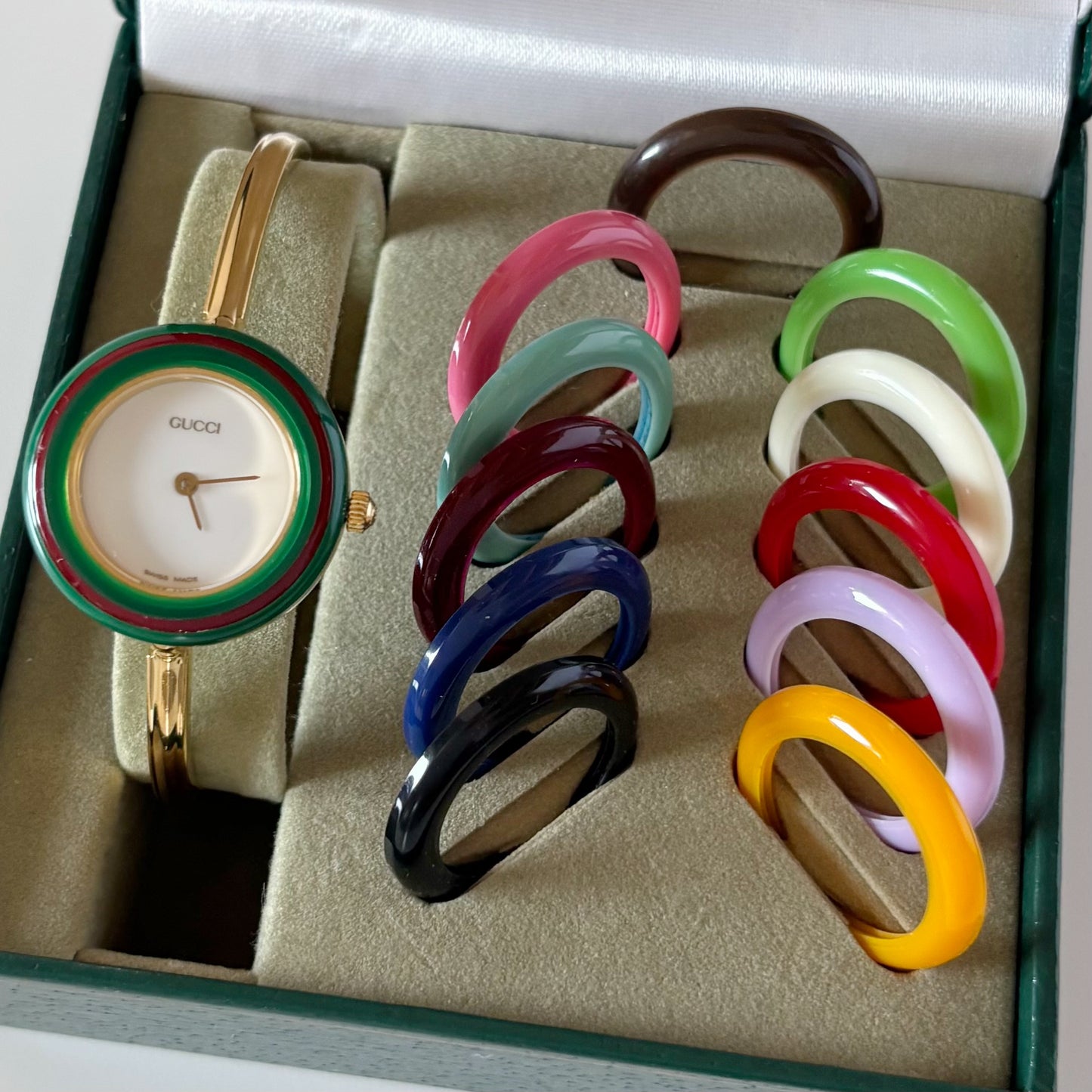 Gucci 1990s Interchangeable Bezel Gold Plated Bangle Watch with 12 bezels, case