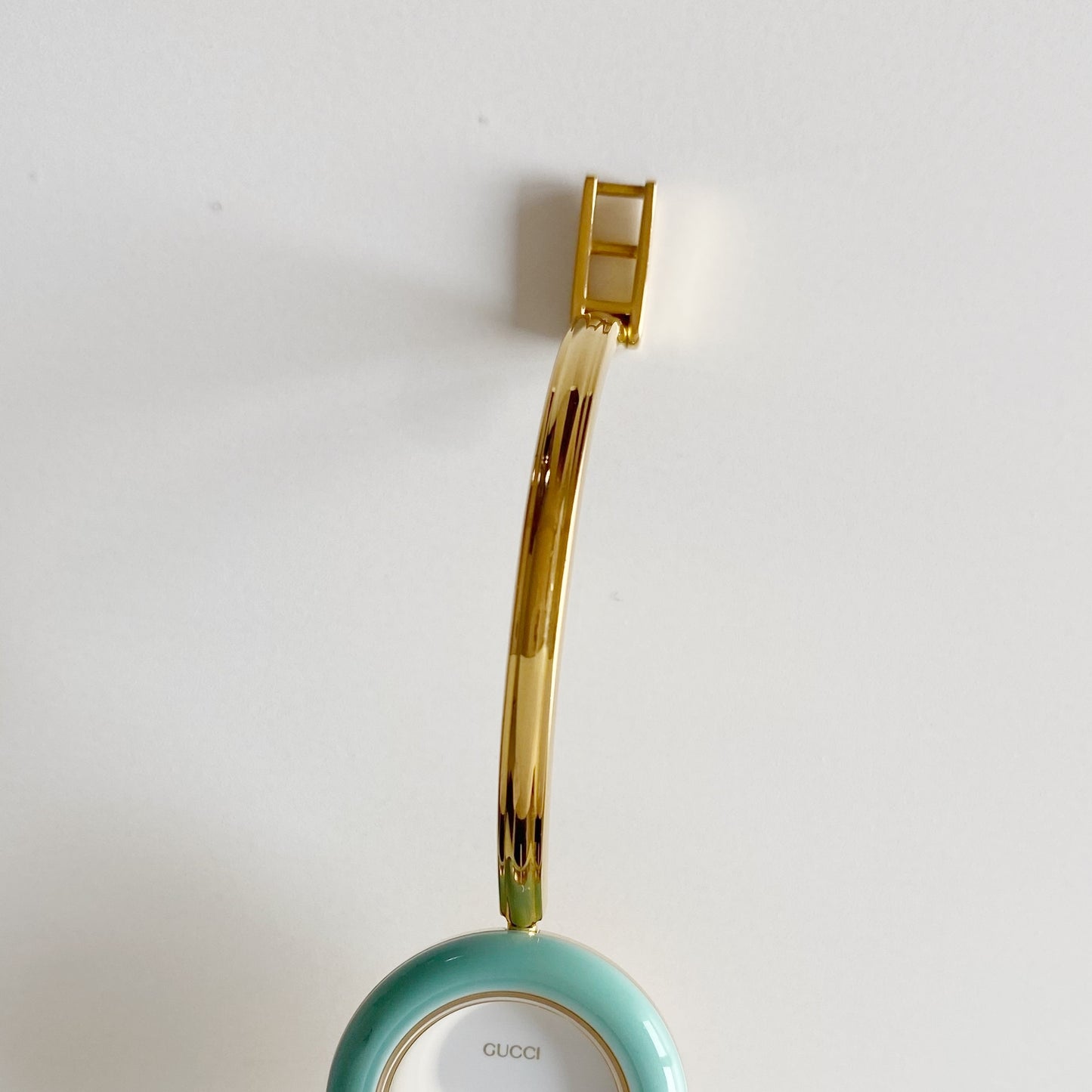 Gucci 1990s Interchangeable Bezel Gold Plated Bangle Watch with 12 bezels, case