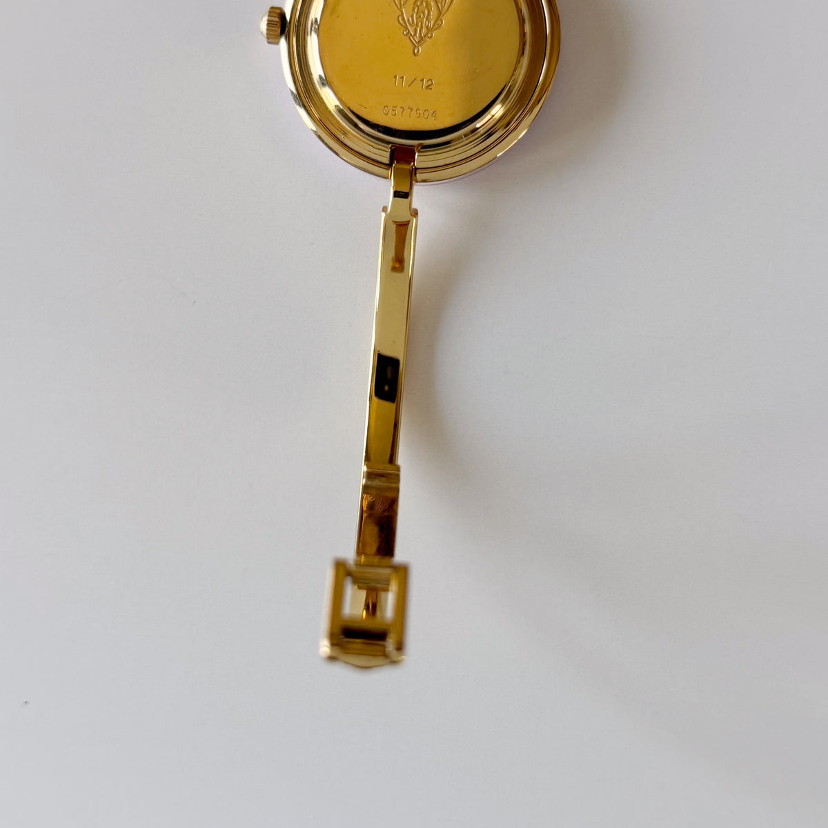 Gucci 1990s Interchangeable Bezel Gold Plated Bangle Watch with 12 bezels, case
