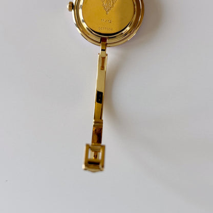 Gucci 1990s Interchangeable Bezel Gold Plated Bangle Watch with 12 bezels, case
