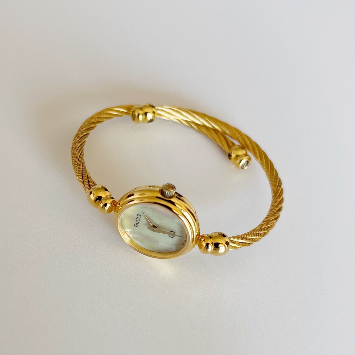 Gucci 1990s Seashell Dial Gold Plated Cable Bangle Watch