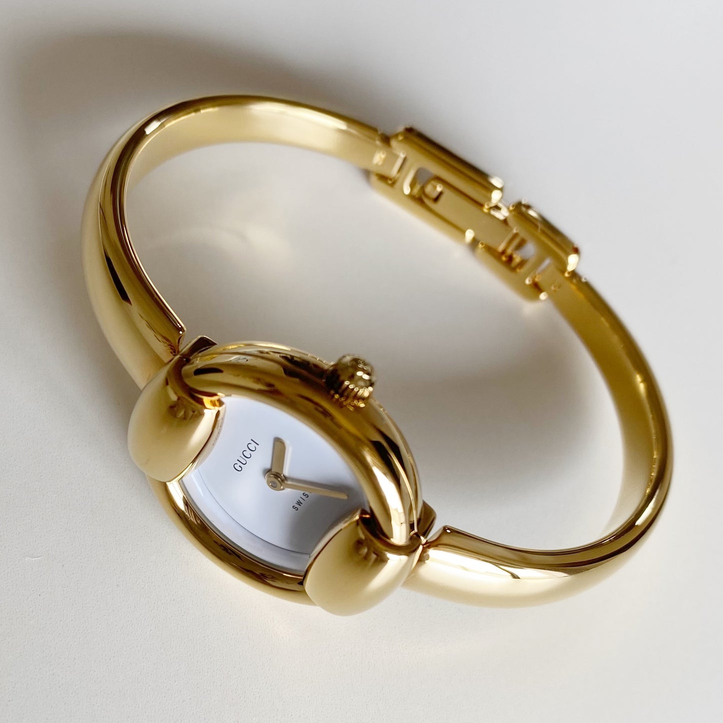 Gucci 1990s Round Dial Gold Plated Bangle Watch