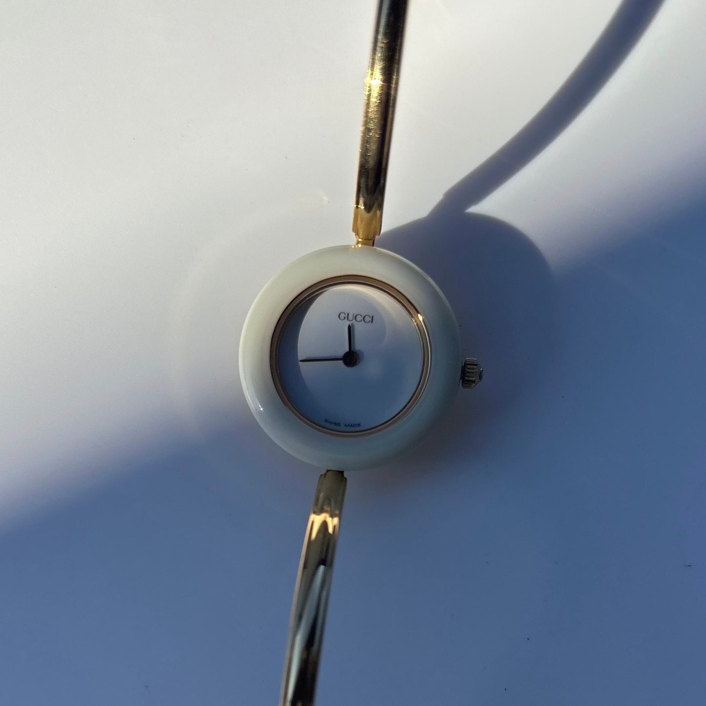 Gucci 1990s Interchangeable Bezel Gold Plated Bangle Watch with 12 bezels, case