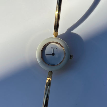 Gucci 1990s Interchangeable Bezel Gold Plated Bangle Watch with 12 bezels, case
