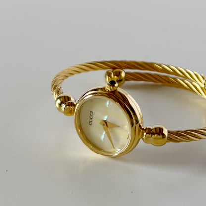 Gucci 1990s Seashell Dial Gold Plated Cable Bangle Watch