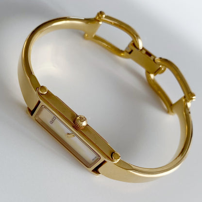 Gucci 1990s Seashell Dial Rectangular Gold Plated  Bangle Watch