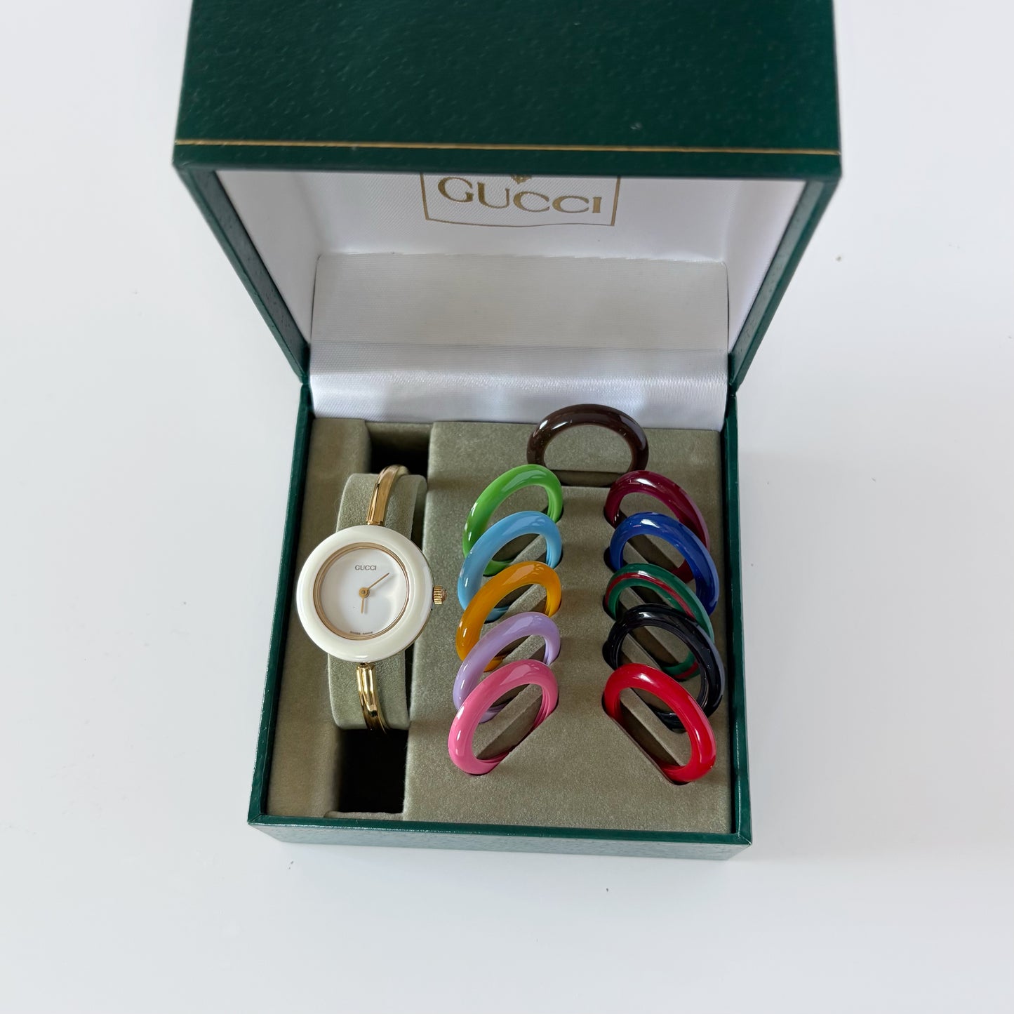 Gucci 1990s Interchangeable Bezel Gold Plated Bangle Watch with 12 bezels, case (Small)