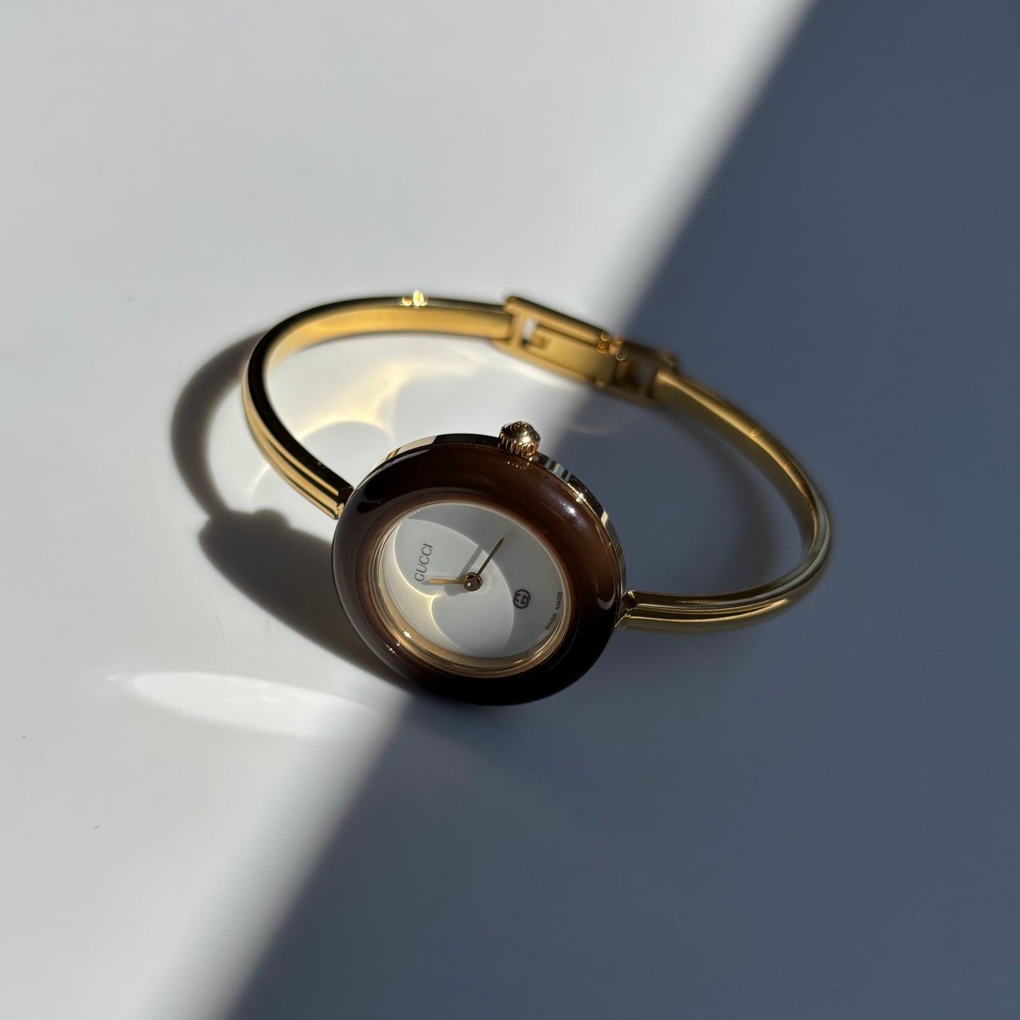 Gucci 1990s Interchangeable Bezel Gold Plated Bangle Watch with 12 bezels, case