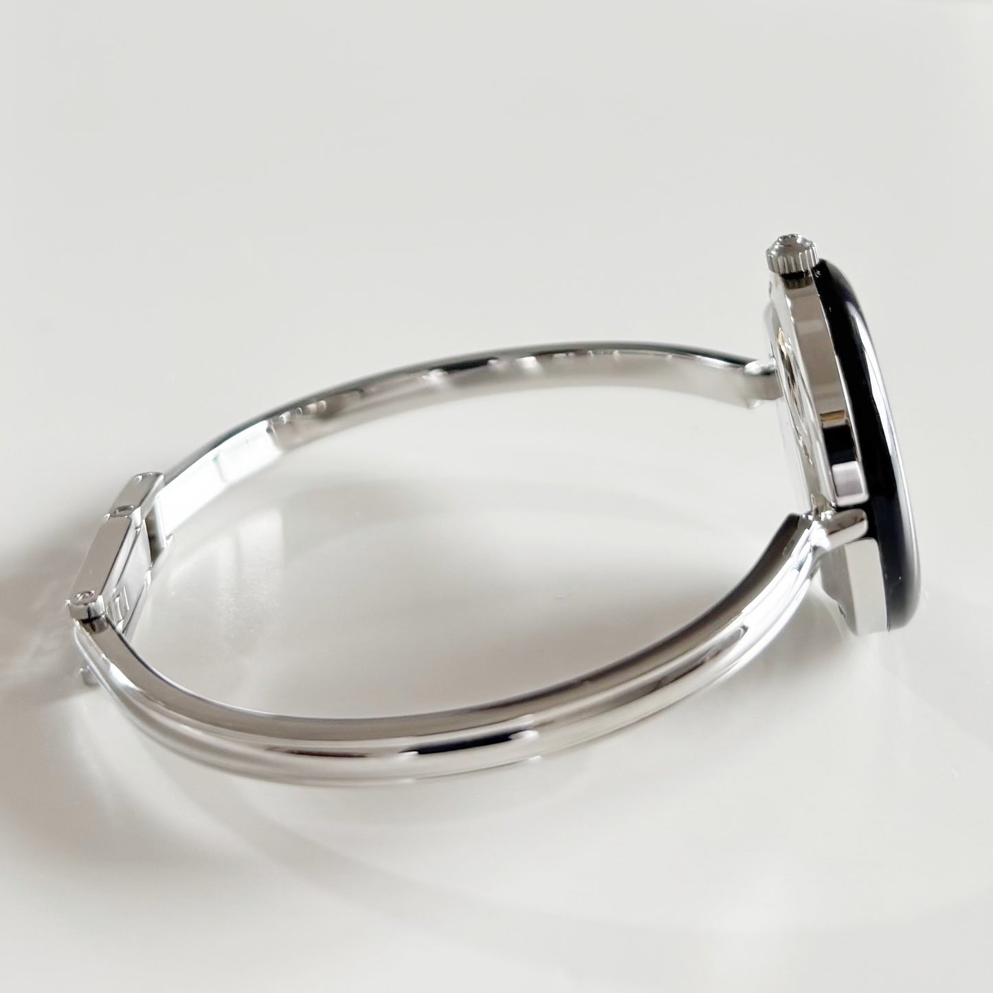 Gucci 1990s Interchangeable Bezel Stainless steel Bangle Watch with 12 bezels, case