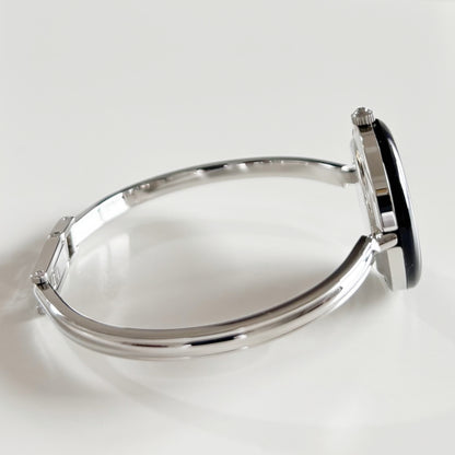 Gucci 1990s Interchangeable Bezel Stainless steel Bangle Watch with 12 bezels, case