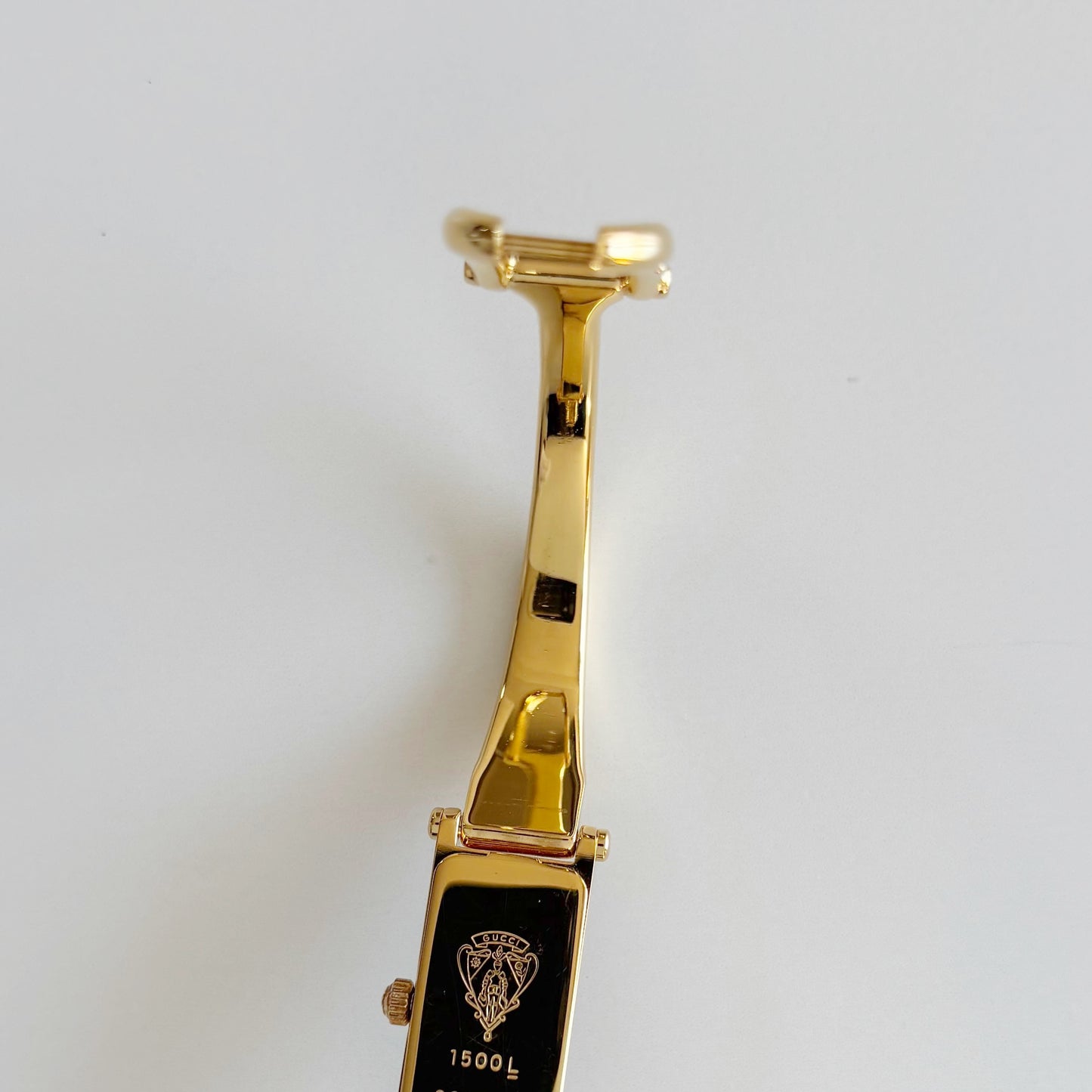 Gucci 1990s Black Rectangular Dial Gold Plated Bangle Watch