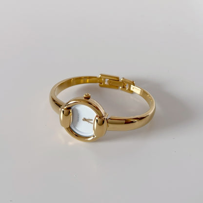 Gucci Round Dial Gold-Plated Bangle Watch