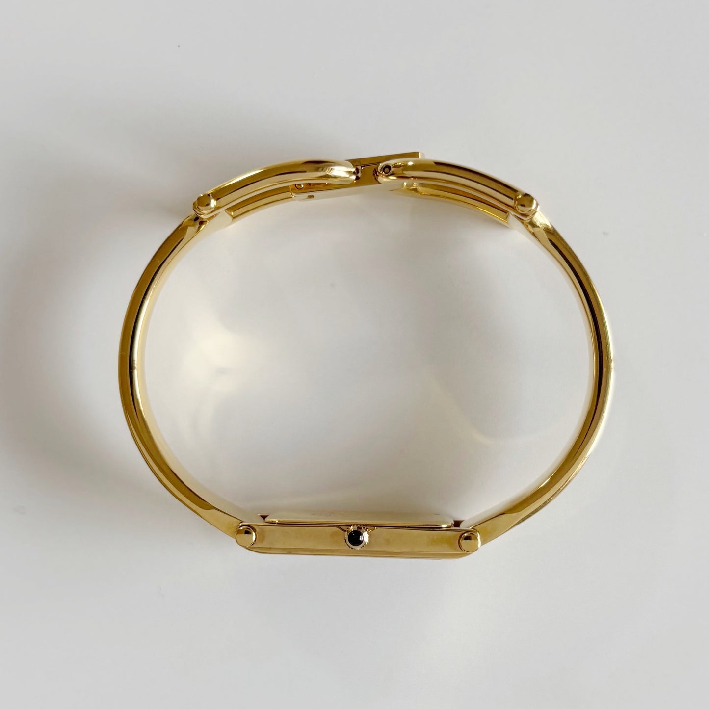 Gucci 1990s Black Dial Rectangular Gold Plated Bangle Watch