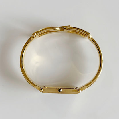 Gucci 1990s Black Dial Rectangular Gold Plated Bangle Watch