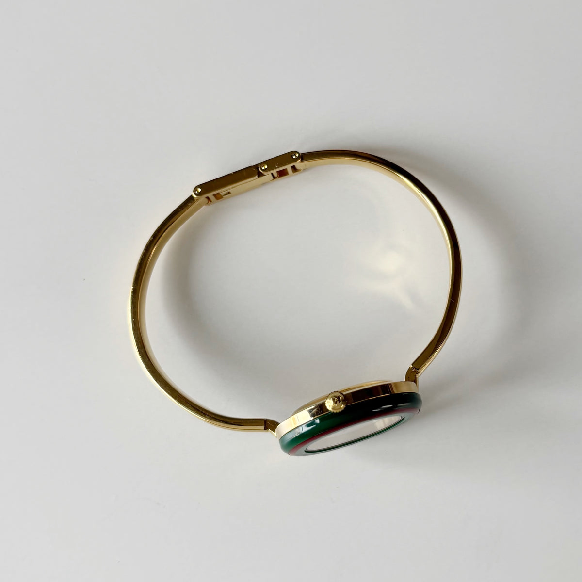 Gucci 1990s Interchangeable Bezel Gold Plated Bangle Watch with 12 bezels, case
