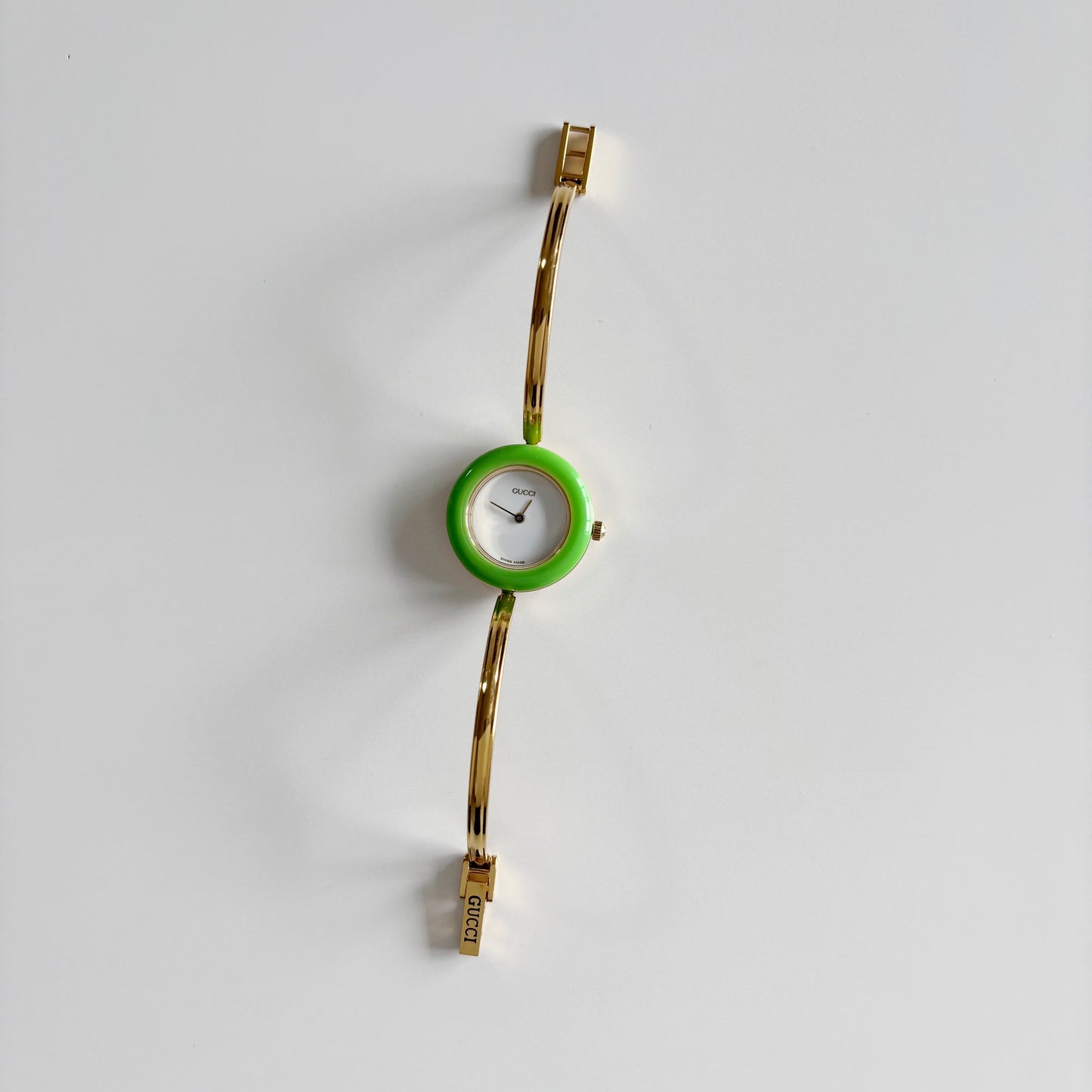 Gucci 1990sInterchangeable Bezel Gold Plated Bangle Watch with 12 bezels, case
