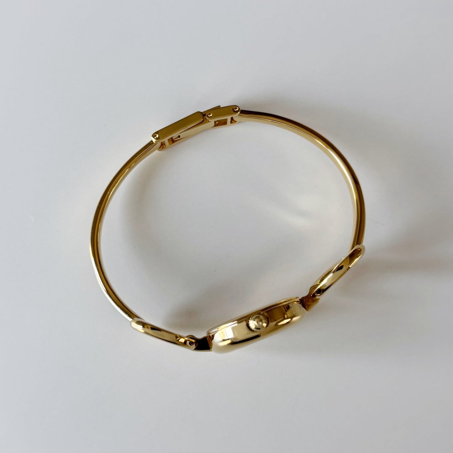 Gucci 1990s Oval Dial Gold Plated Bangle Watch