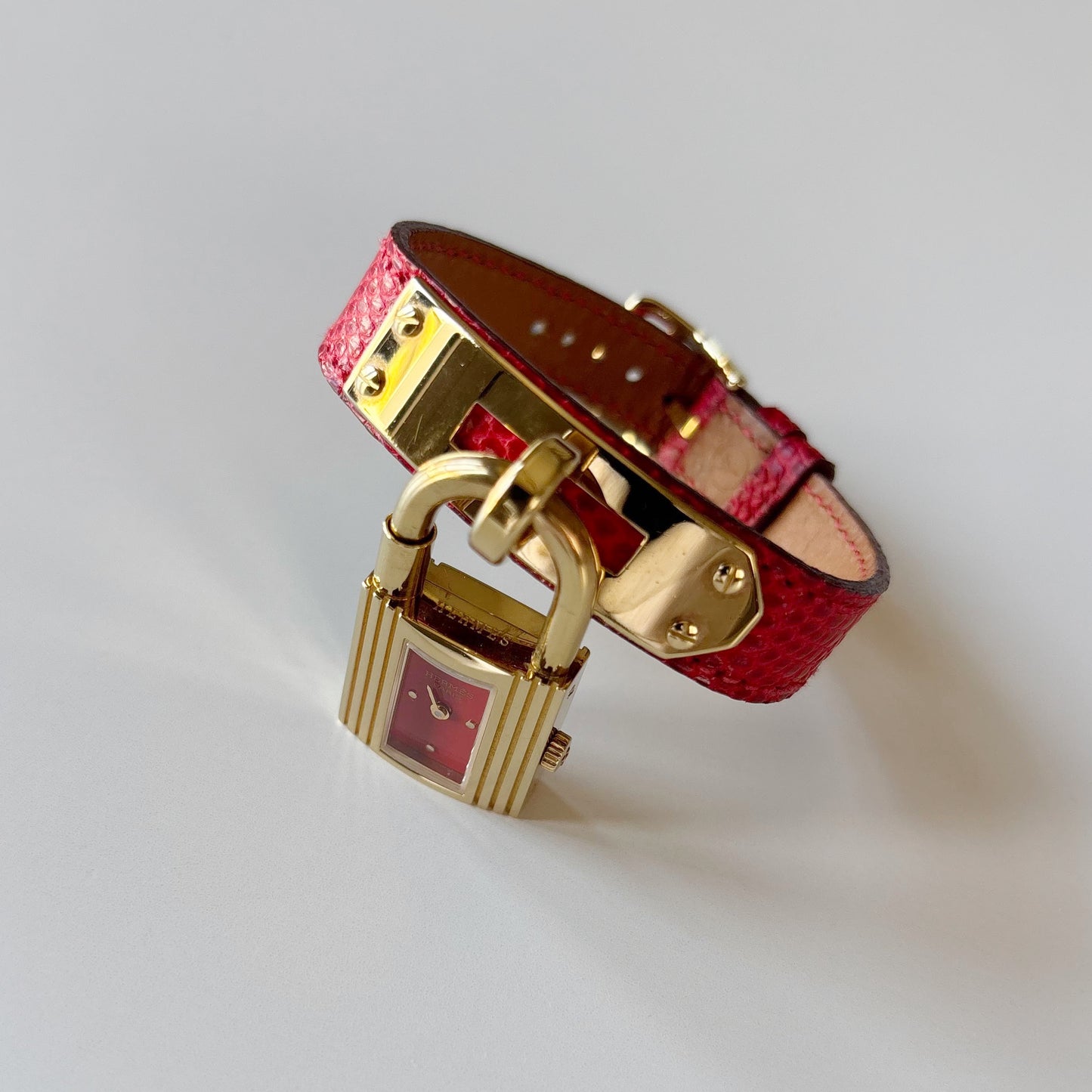 Hermes 1990s Kelly Red Dial Gold Plated Watch