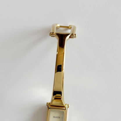 Gucci 1990s Seashell Rectangular Dial Gold Plated Bangle Watch