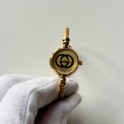 Gucci 1980s Round Dial Cable Band Bangle Watch