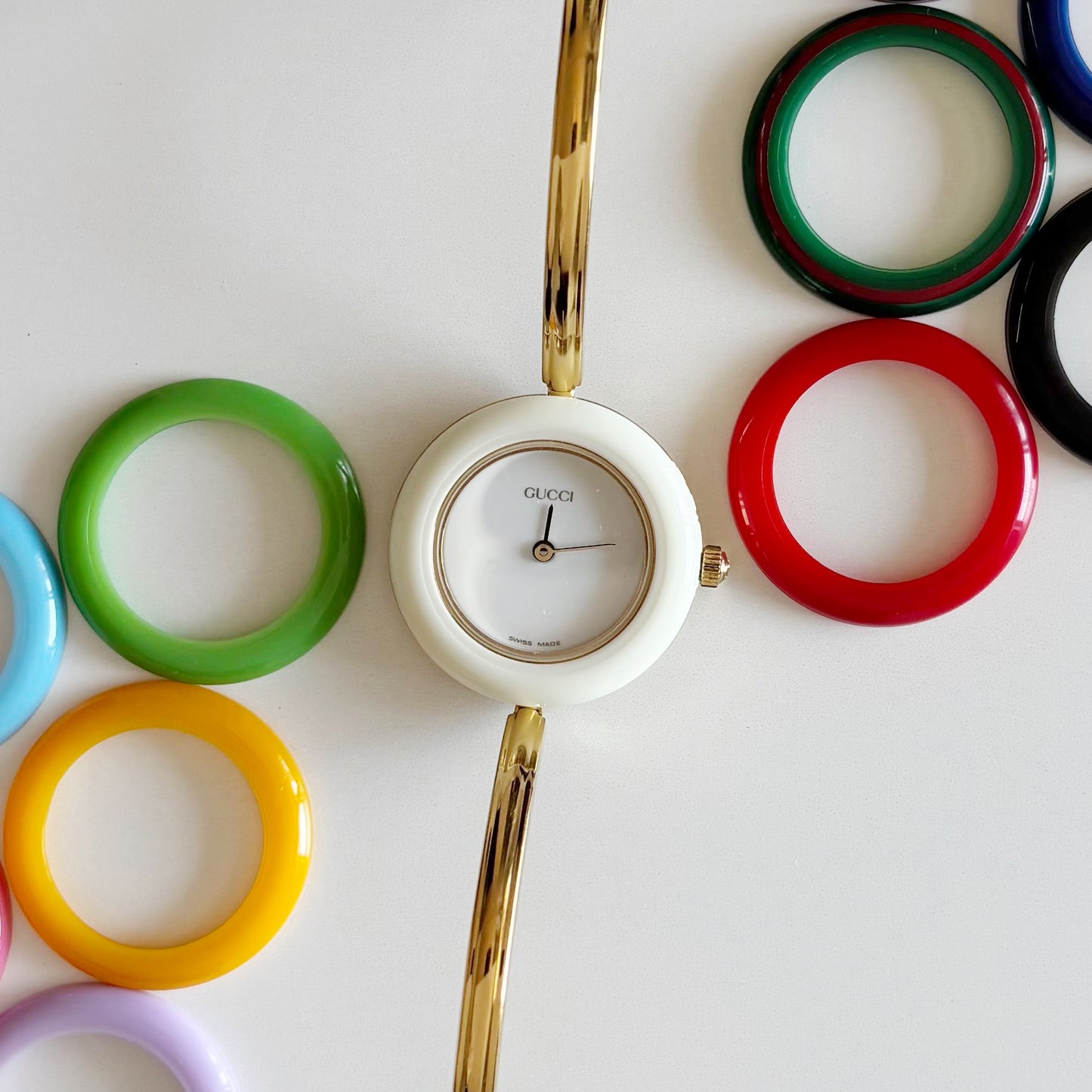 Gucci 1990s Interchangeable Bezel Gold Plated Bangle Watch with 12 bezels, case (Small)