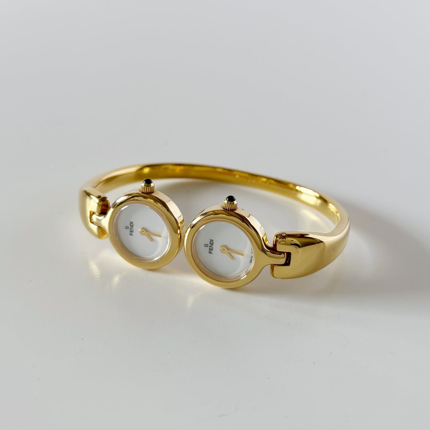 Fendi 1990s Seashell Dial Two Time Zone Gold Plated Bangle Watch