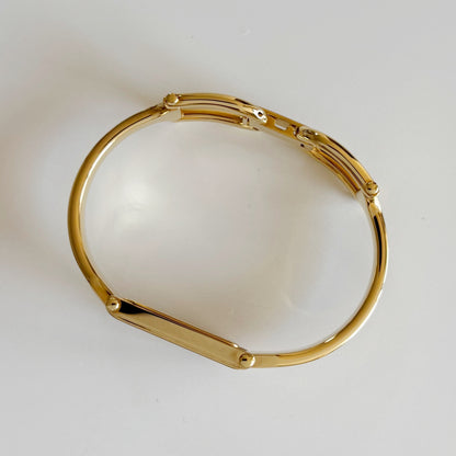 Gucci 1990s Rectangular Dial Gold Plated Bangle Watch