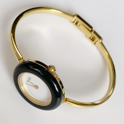 Gucci 1990s Interchangeable Bezel Gold Plated Bangle Watch with 12 bezels, case