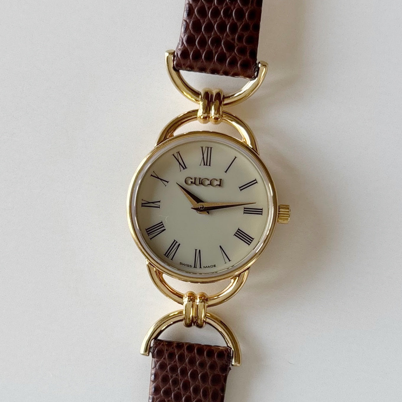 Gucci 1990s Round Cream Dial Horsebit Gold Plated Watch