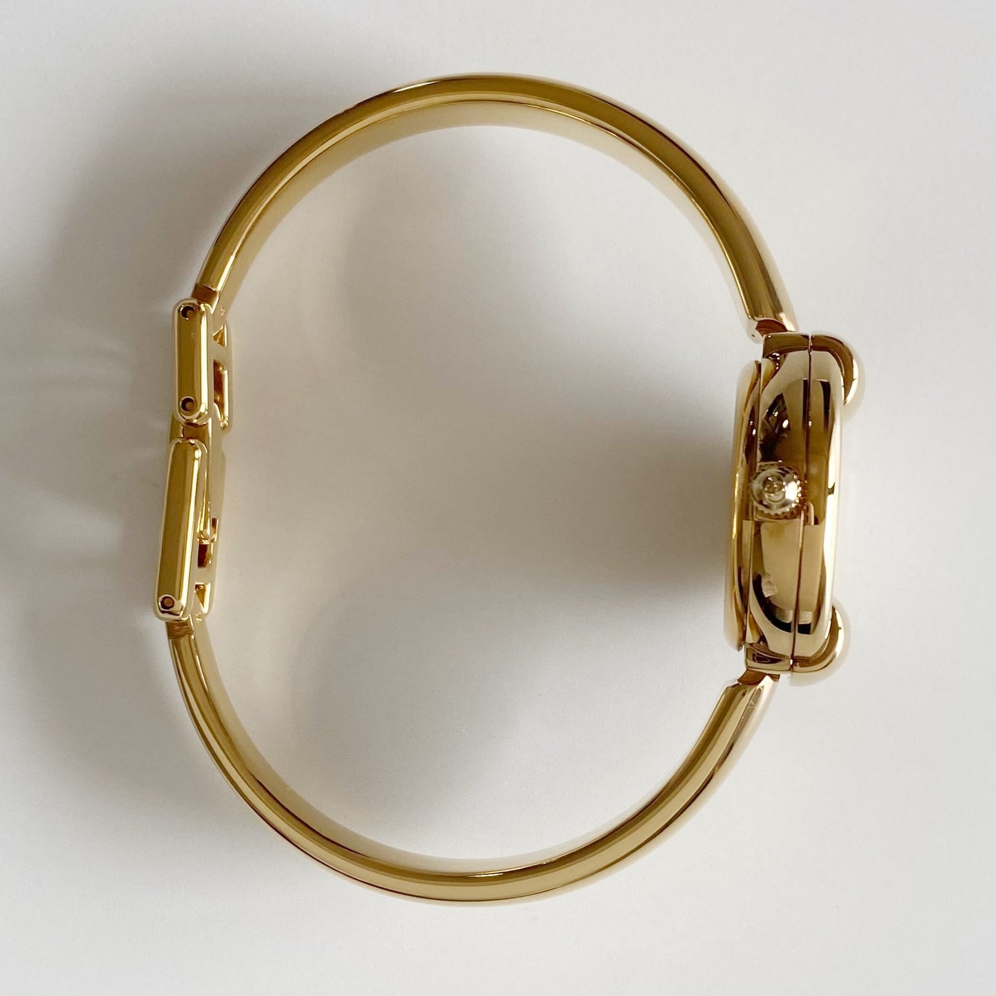 Gucci 1990s Round Dial Gold Plated Bangle Watch